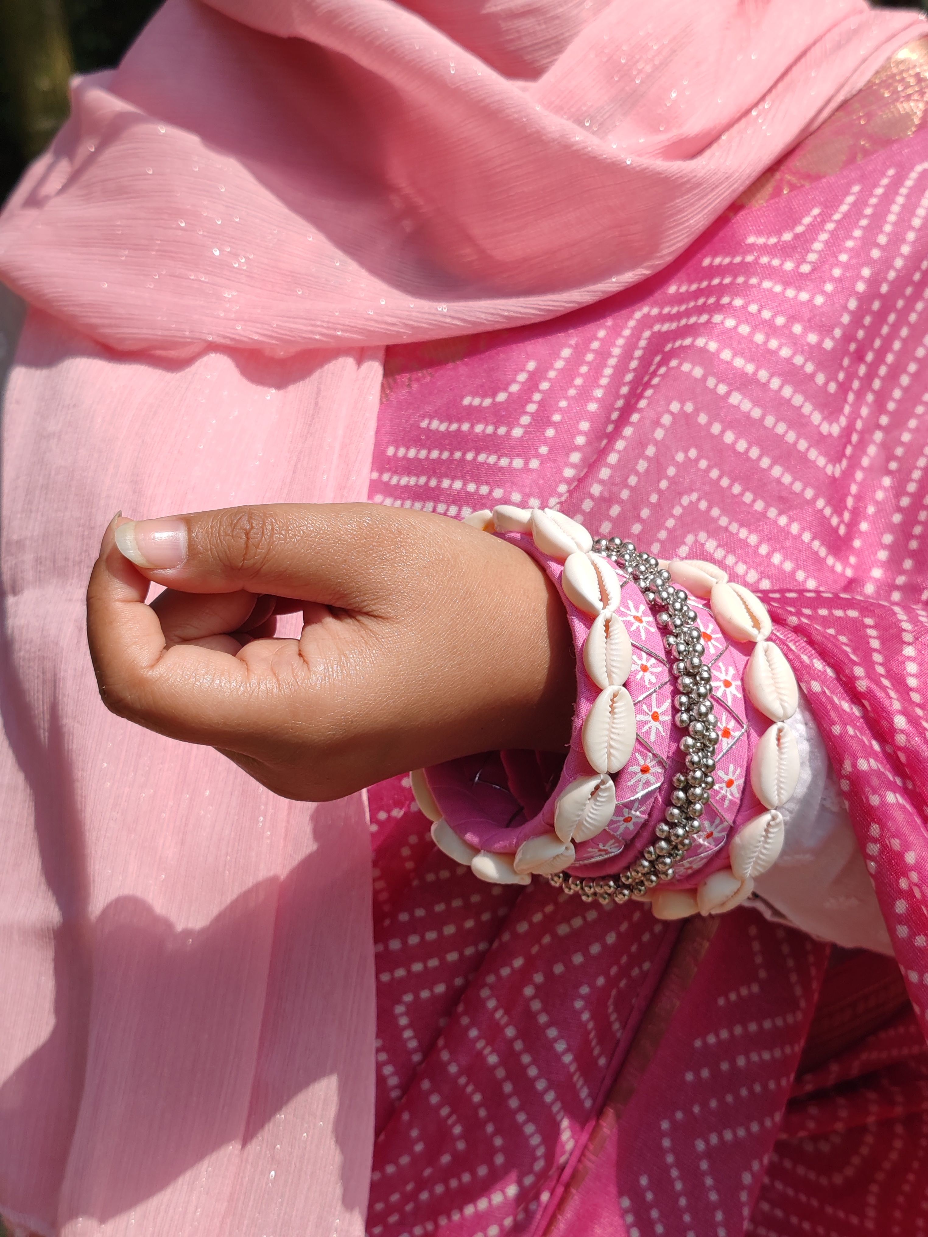 Pink cowrie shell bangles